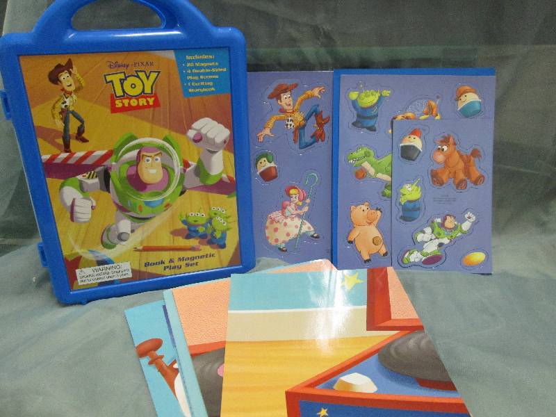 lot 4 image: Disney Pixar Toy Story Book & Magne...