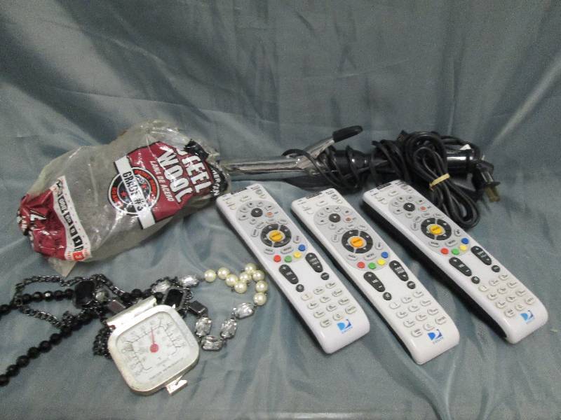 lot 52 image: 3 Universal Remotes, curling iron, ...