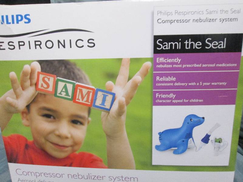 lot 73 image: Samin the Seal Nebulizer system...