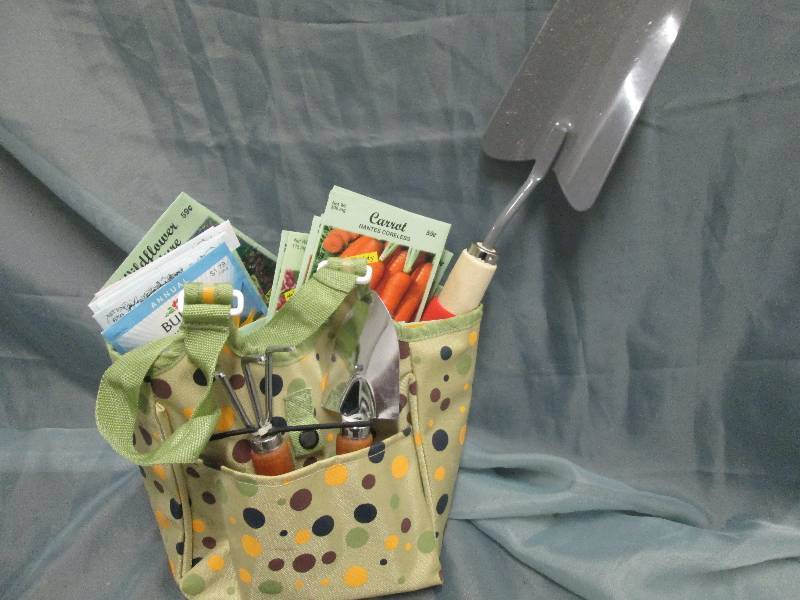 lot 79 image: Garden Tote full of seed packets, t...