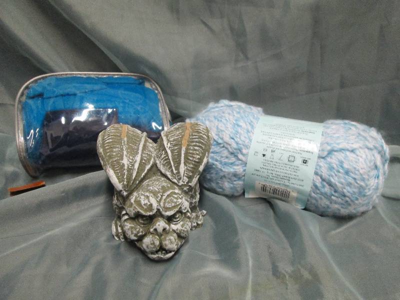 lot 83 image: Skein of yarn, ceramic gargoyle, fl...