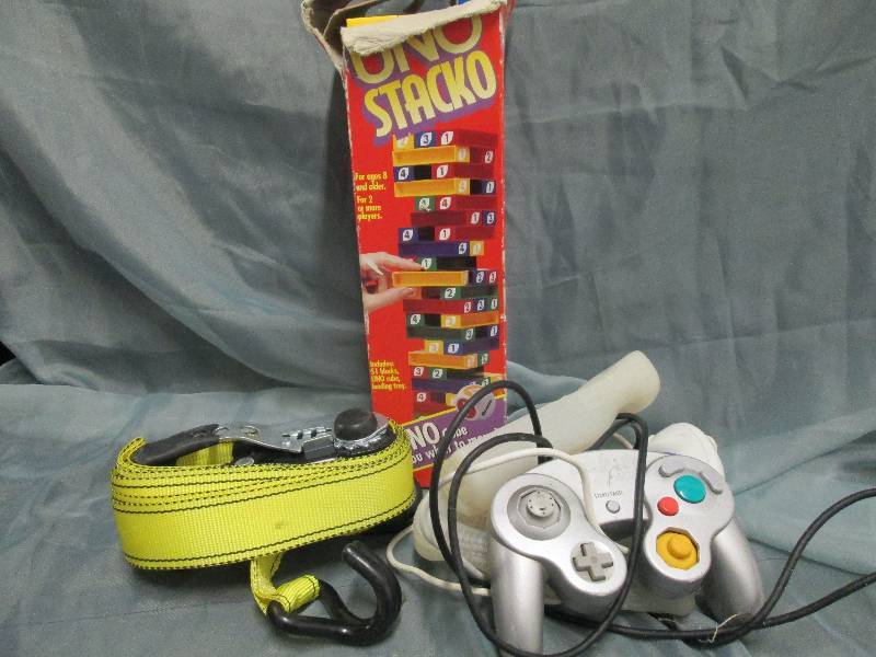 lot 87 image: Uno Stacko, strap, game covers...