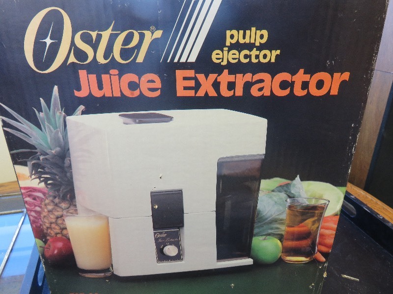 lot 22 image: Oster Juice Extractor in Original Box
