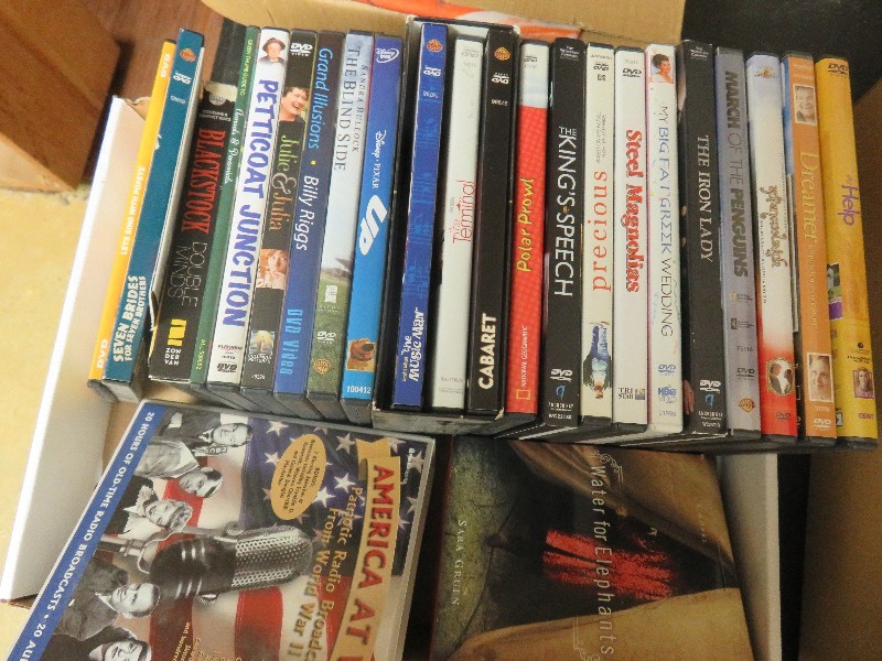 lot 64 image: DVD Movies & America at War CD Set