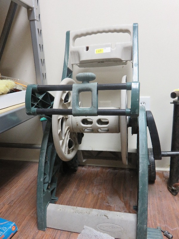 lot 110 image: Plastic Garden Hose Reel on Wheels