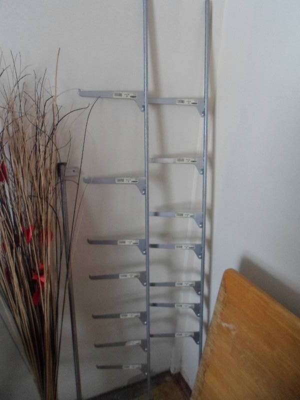 lot 19 image: 2 Adjustable Metal Shelves wBrackets