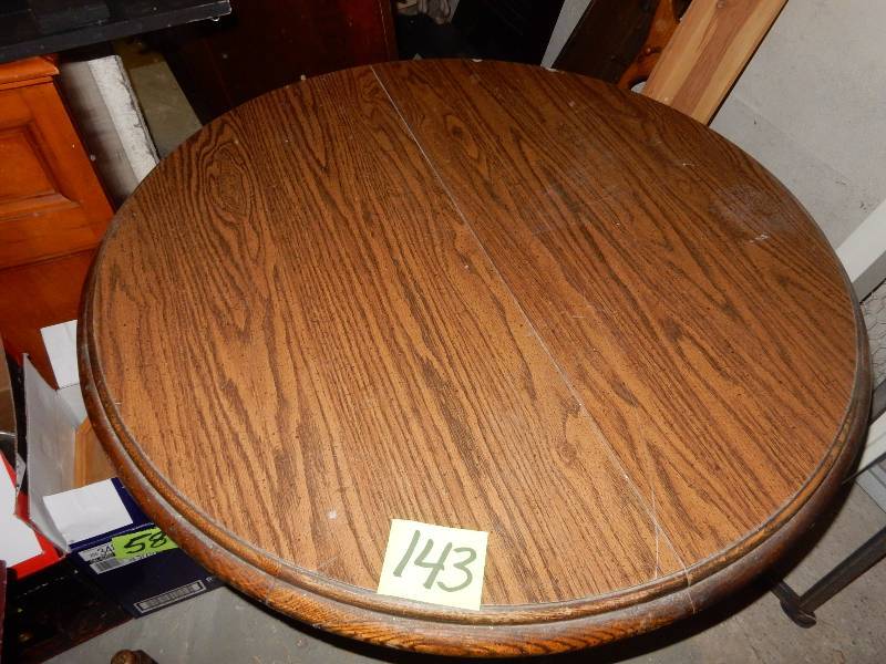 42 in Diameter Table.. Simulated wood top, Solid wood base