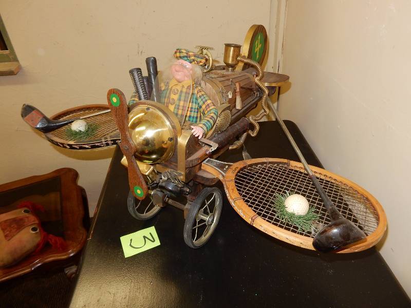 Attention Golfers..and Packer Fans.. What a model Airplane.. Looking For a Great Golf Trophy HERE IT IS