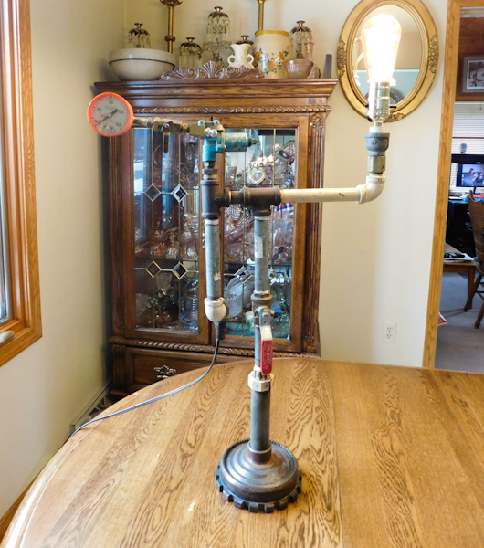 steampunk lamp the lamp works the light is on note the Edison bulb