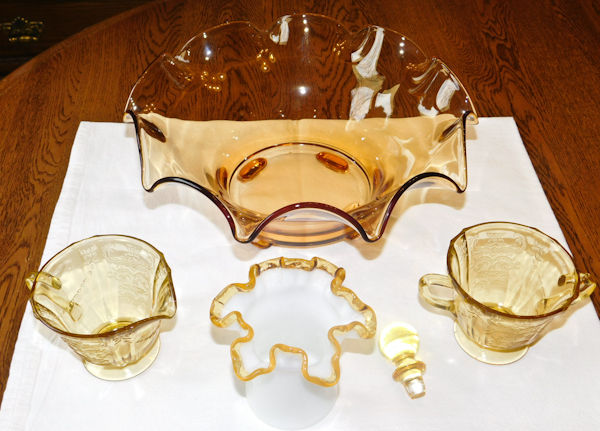 amber depression glass items and a white Fenton small vase amber ruffle glass
