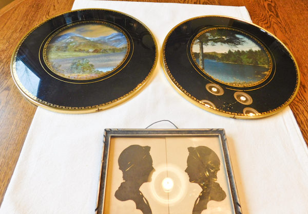 wall art silhouettes of early Americans and convex glass metallic prints