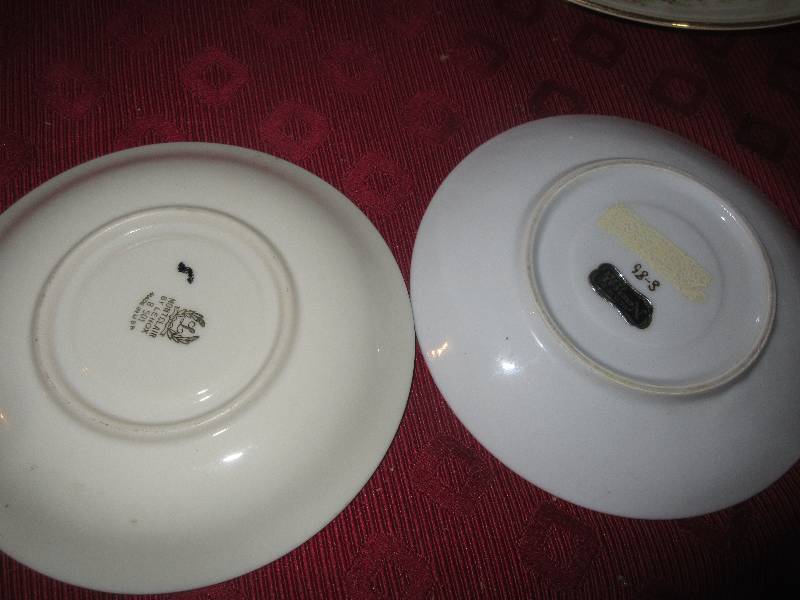 TEA CUPS AND SAUCERS