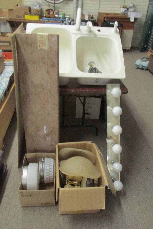 Sink, lighting and a stair tread, g...