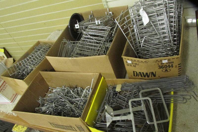 Lot of shelf dividers and peg hooks...