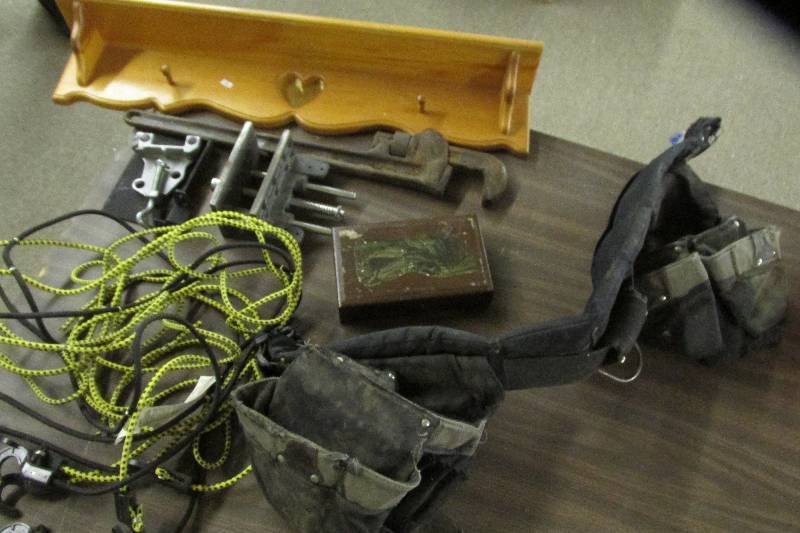 Tool belt, pipe wrench, tie downs...