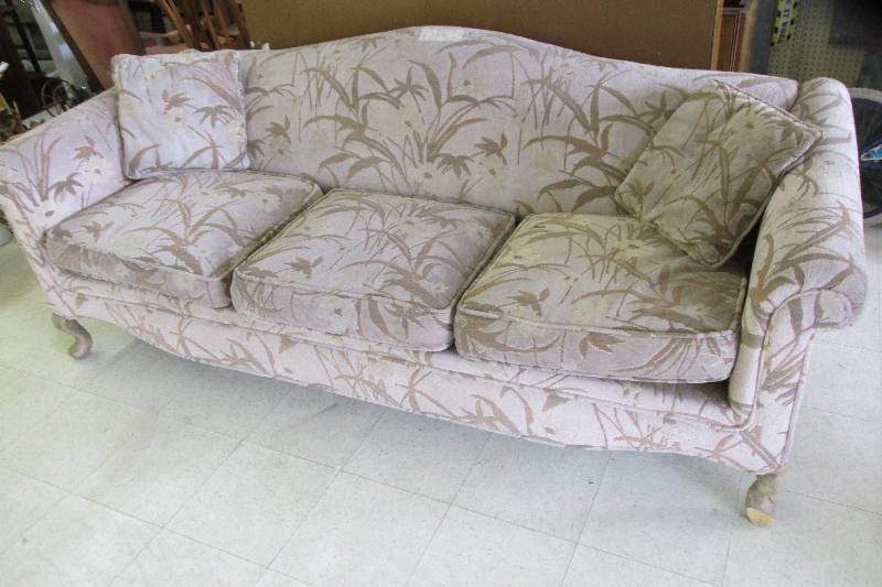 Couch with wood legs, one chipped...
