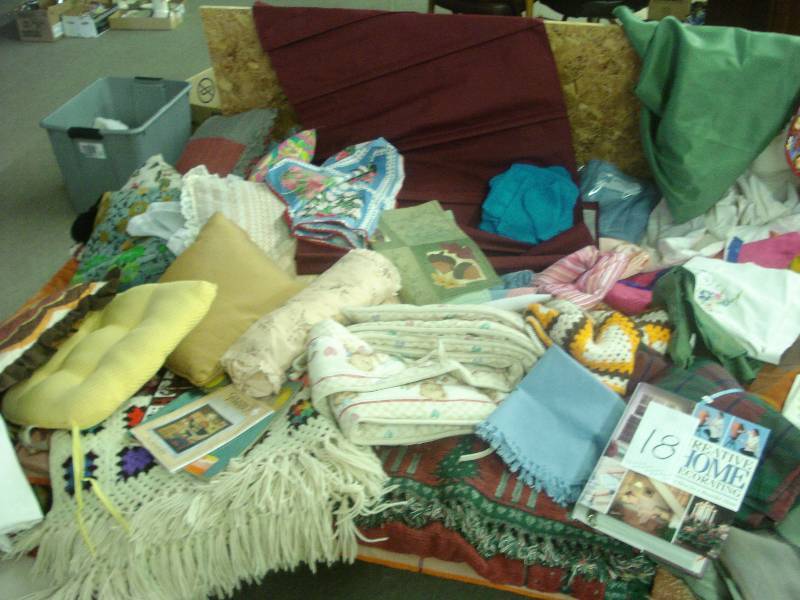 Lot of pillows, afghans, sheets and...