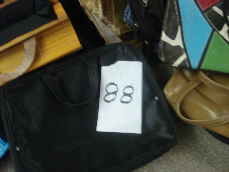 Lot of ladies handbags...