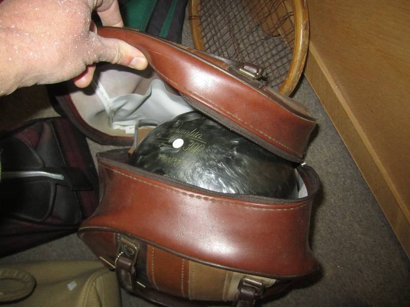 Lot of gold and bowling bags, one b...