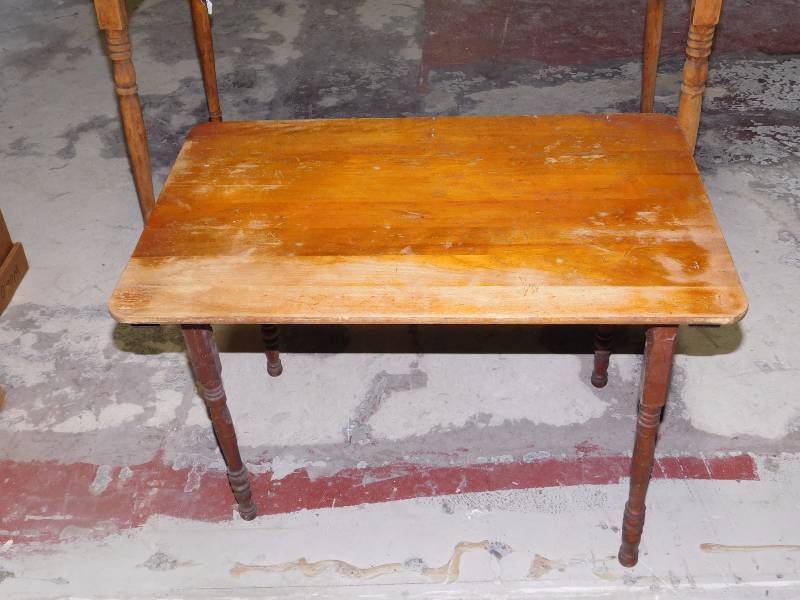 These folding wooden sewing tables were made by the Paris Mfg. Co.