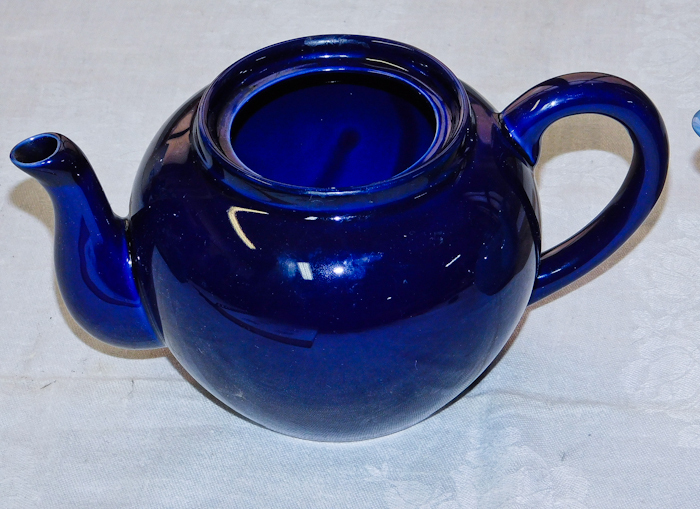 two unmarked  tea pots cobalt blue and light blue