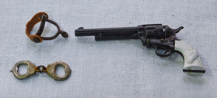 mini western toy items pistol, handcuffs, spur