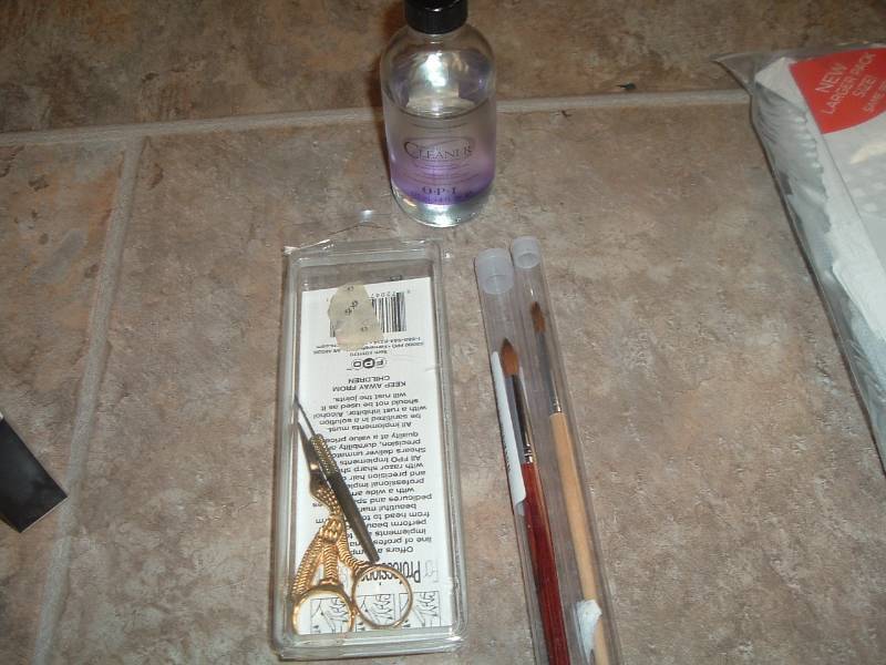 2 Nail brushes, tools, and Cleaner