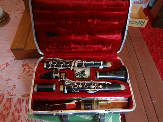 lot 62 image: Bundy Clarinet, Music Stand, Sheet Music