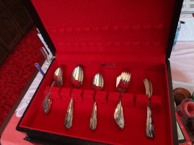 lot 81 image: Huge lot candles, snackware, Knives,Every thing on these shelves