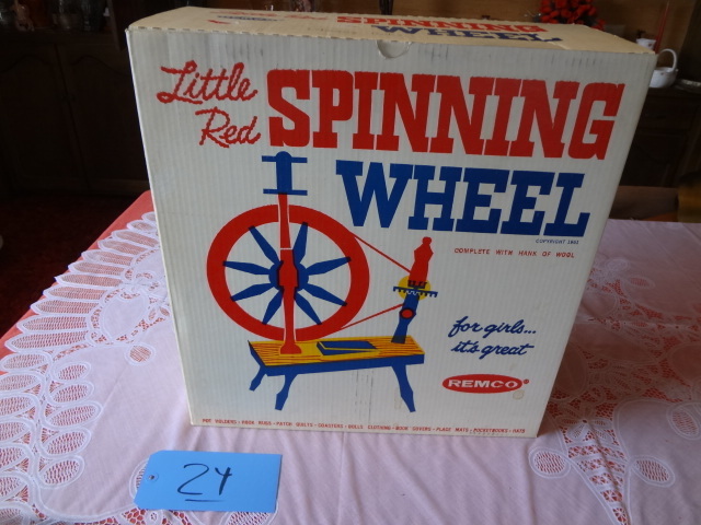 lot 24 image: Toy Spinning Wheel