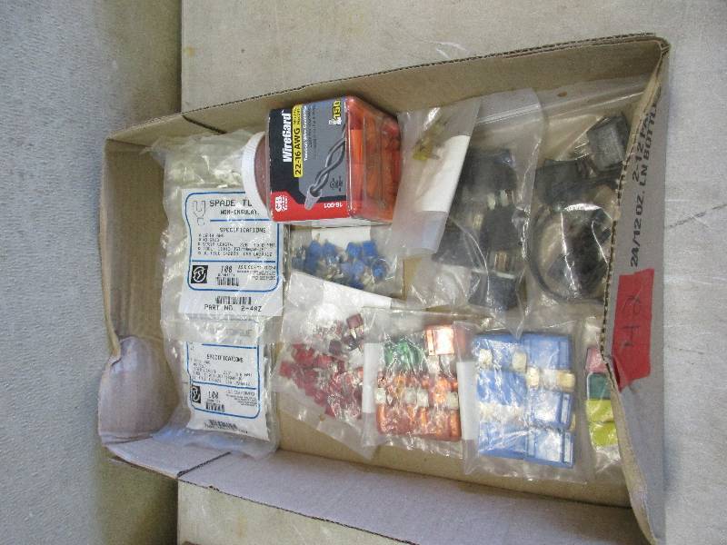 Box full of automotive fuses
