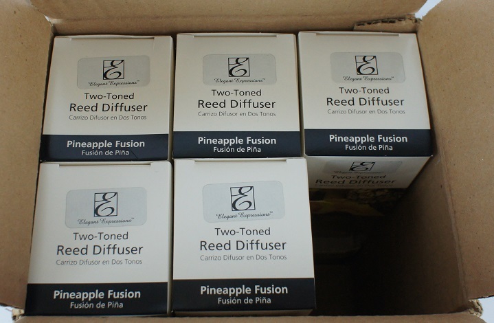 lot 822 image: Elegant Expressions Pineapple Fusion Reed Diffusers with reeds