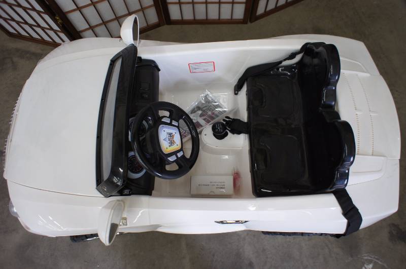 lot 22 image: 12 volt Convertible Power Wheel
