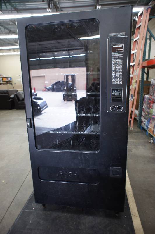 lot 23 image: Vending Machine Model #3129
