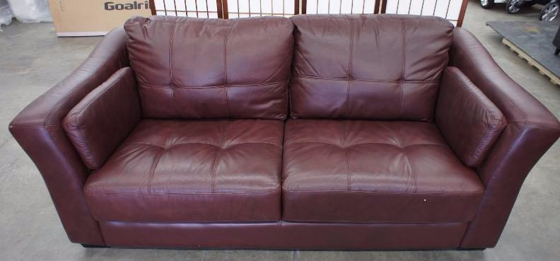 lot 35 image: High End Leather Loveseat