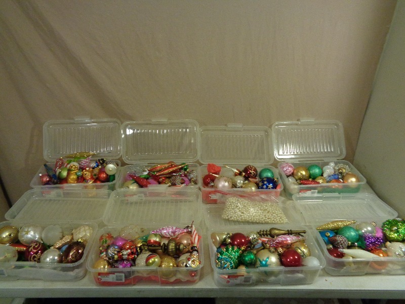 8 Plastic Organizers Full of Christmas Ornaments