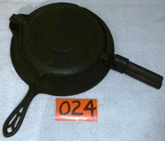 lot 24 image: Griswold Waffle Iron The American