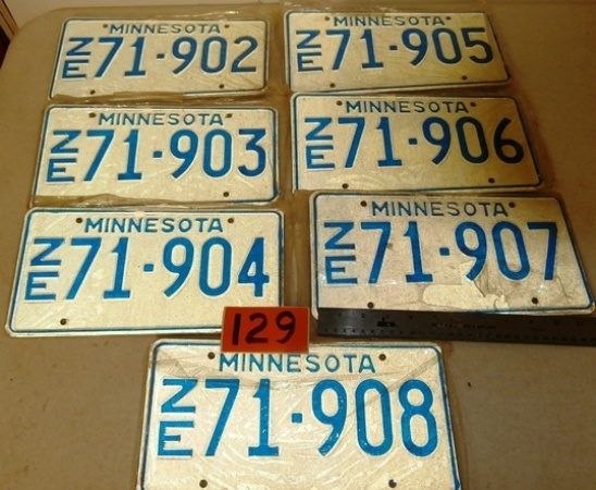 lot 129 image: 7 Minnesota License Plates