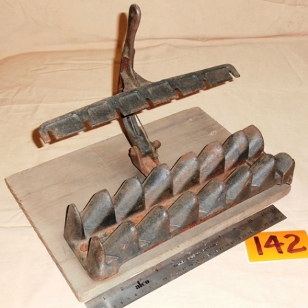 lot 142 image: Primitive Cast Iron Egg Carton Maker
