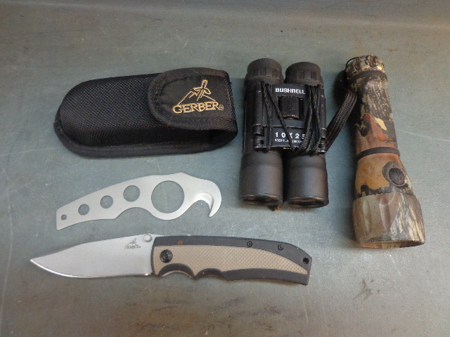 lot 10 image: Camo Flash Light, Gerber Skinning Knife & Binoculars