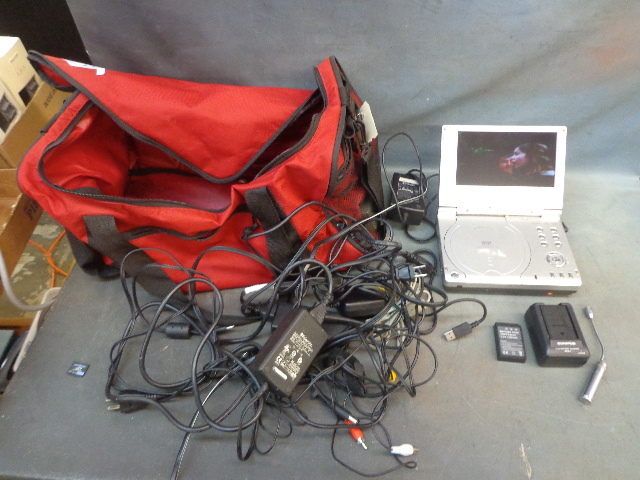 lot 33 image: Red Duffle Bag, polaroid DVD Player,Canon Battery Charger & More