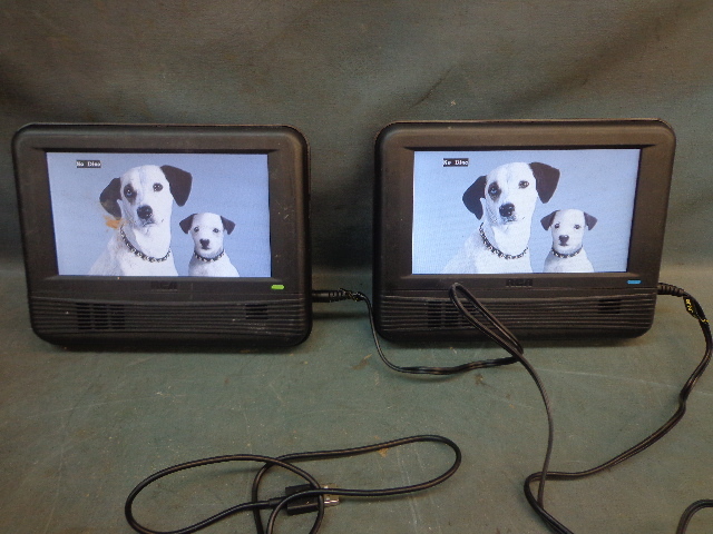lot 36 image: Twin Mobile DVD Players & Dell AC Adaptor