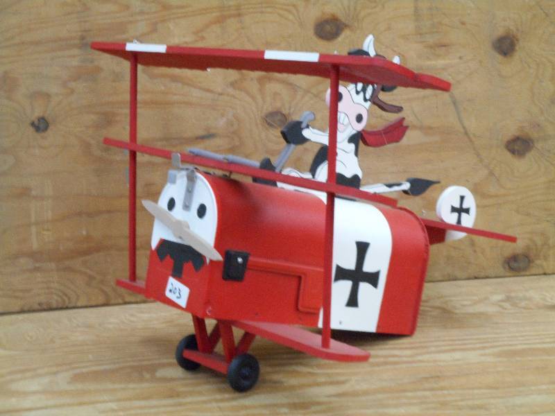 Unique Cow Driving Airplane Mailbox...