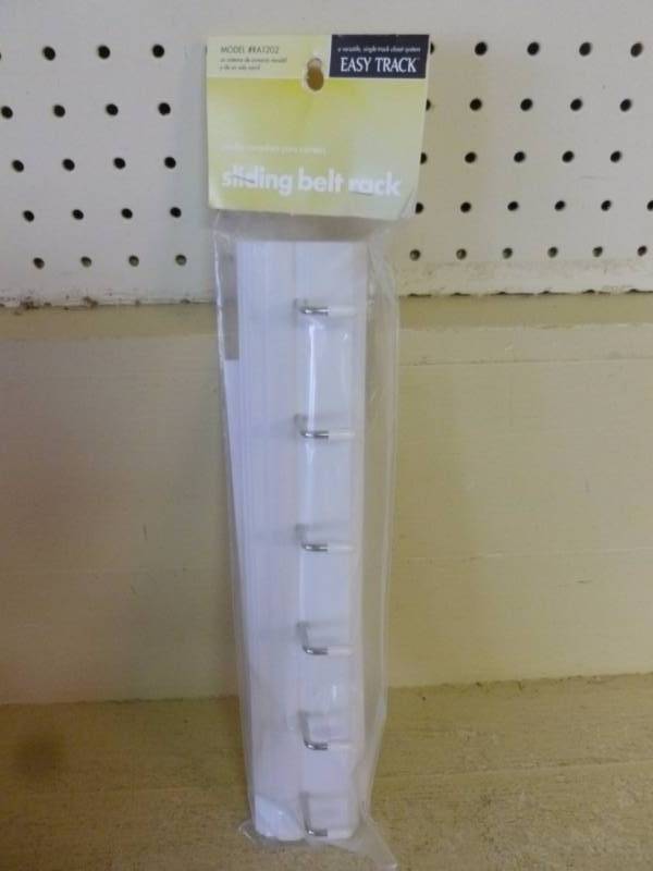 lot 380 image: New Sliding Belt Rack