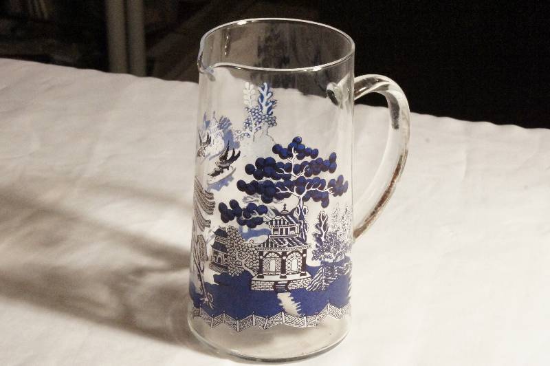 lot 408 image: Blue Willow Pitcher  Approx. 7 34 H