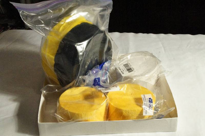 lot 413 image: Crepe Streamer Paper (White, Goldyellow, and Black)