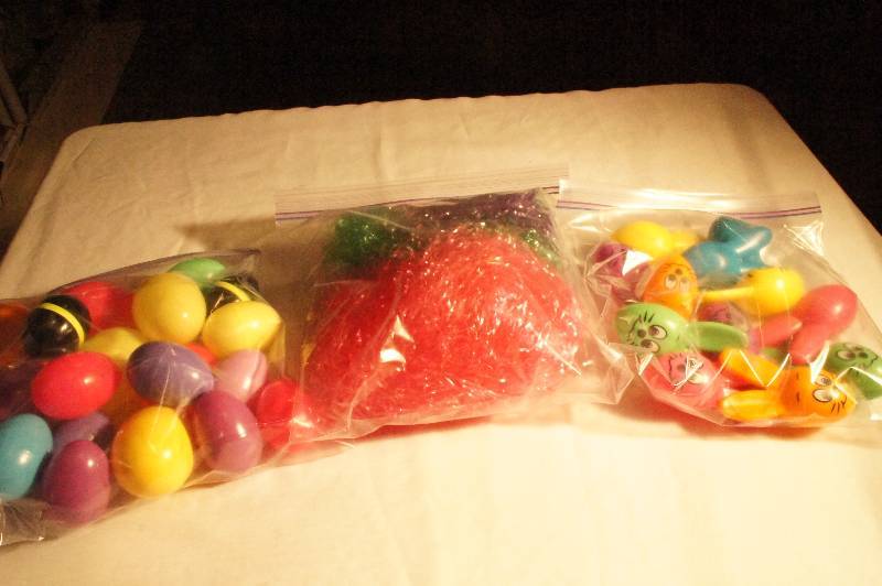 lot 482 image: Easter Lot - 1 Bags of Eggs, 1 Bag of Bunny Face Eggs and 1 Bag of Grass
