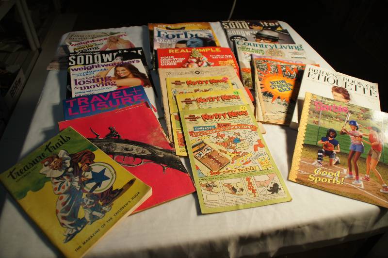 lot 559 image: Lot of Magazines - Travel, Treasure Trails, Weight Watchers, Songwriter, Forbes, Real Simple, Time (Nixon), Brides Book of Etiquette