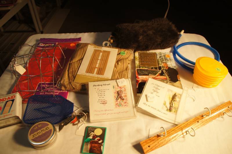 lot 562 image: LOT - Air Mattress Pump, Furry Window Scraper, Ply Swatter, Metal Light Covers, Table Cloth, Lavender Rub, Breast Cancer Pin, ETC