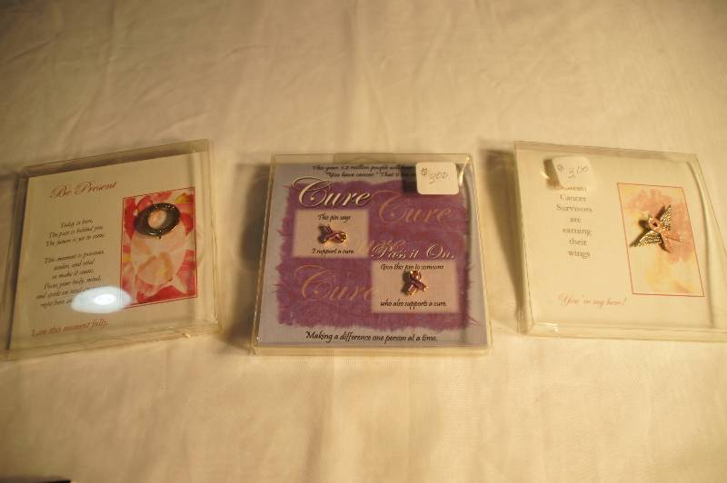lot 569 image: Lot of 3 new Gifts - Cure Pins, Breast Cancer Pin and Be Present Pin